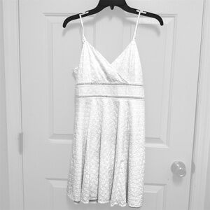 5/$20 White Sleeveless V-Neck Mini Sundress